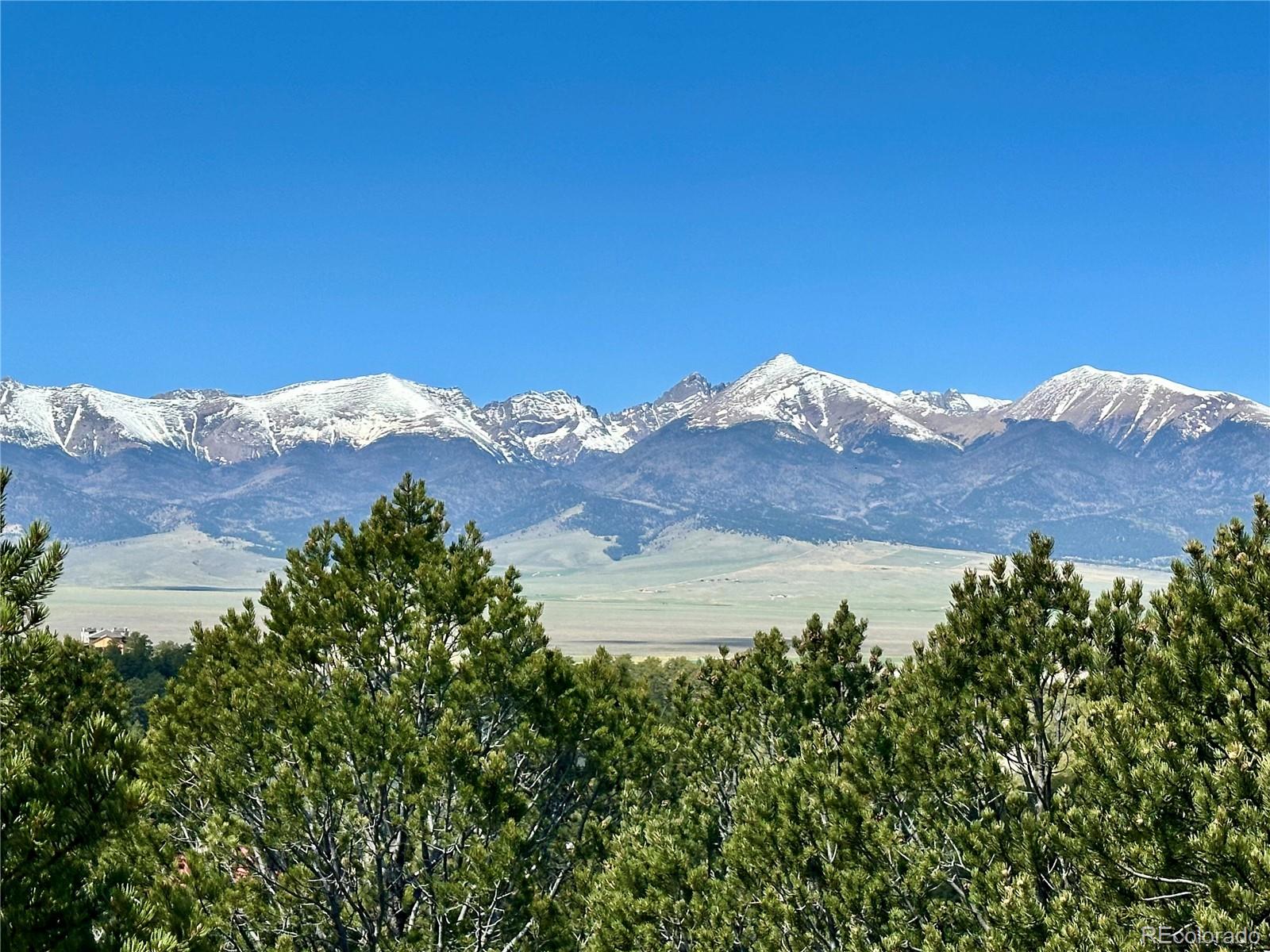 a view of lake and mountain