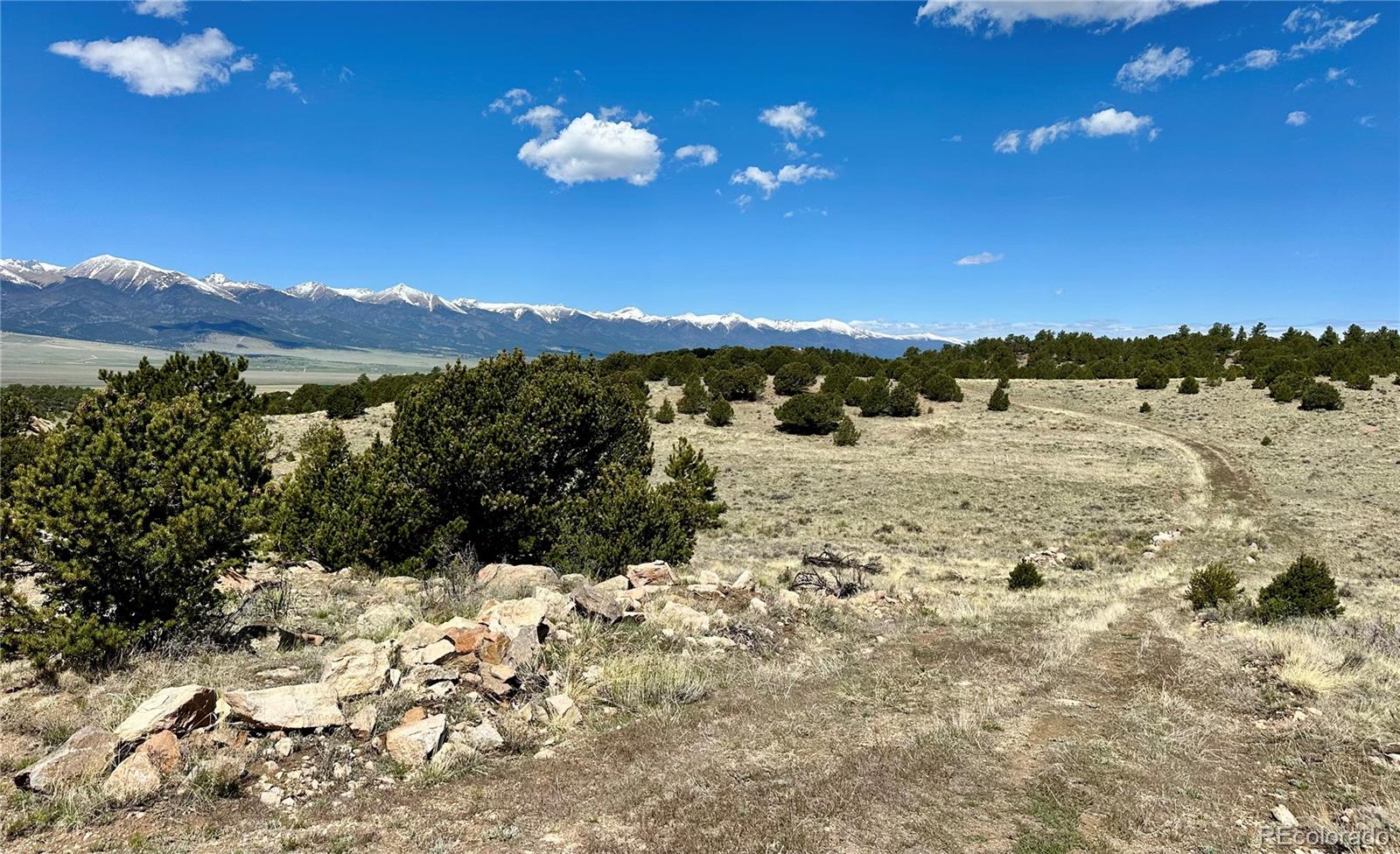 349 Navajo Road Westcliffe, CO 81252 - Photo 11 of 15 a view of a lake with a mountain in the background