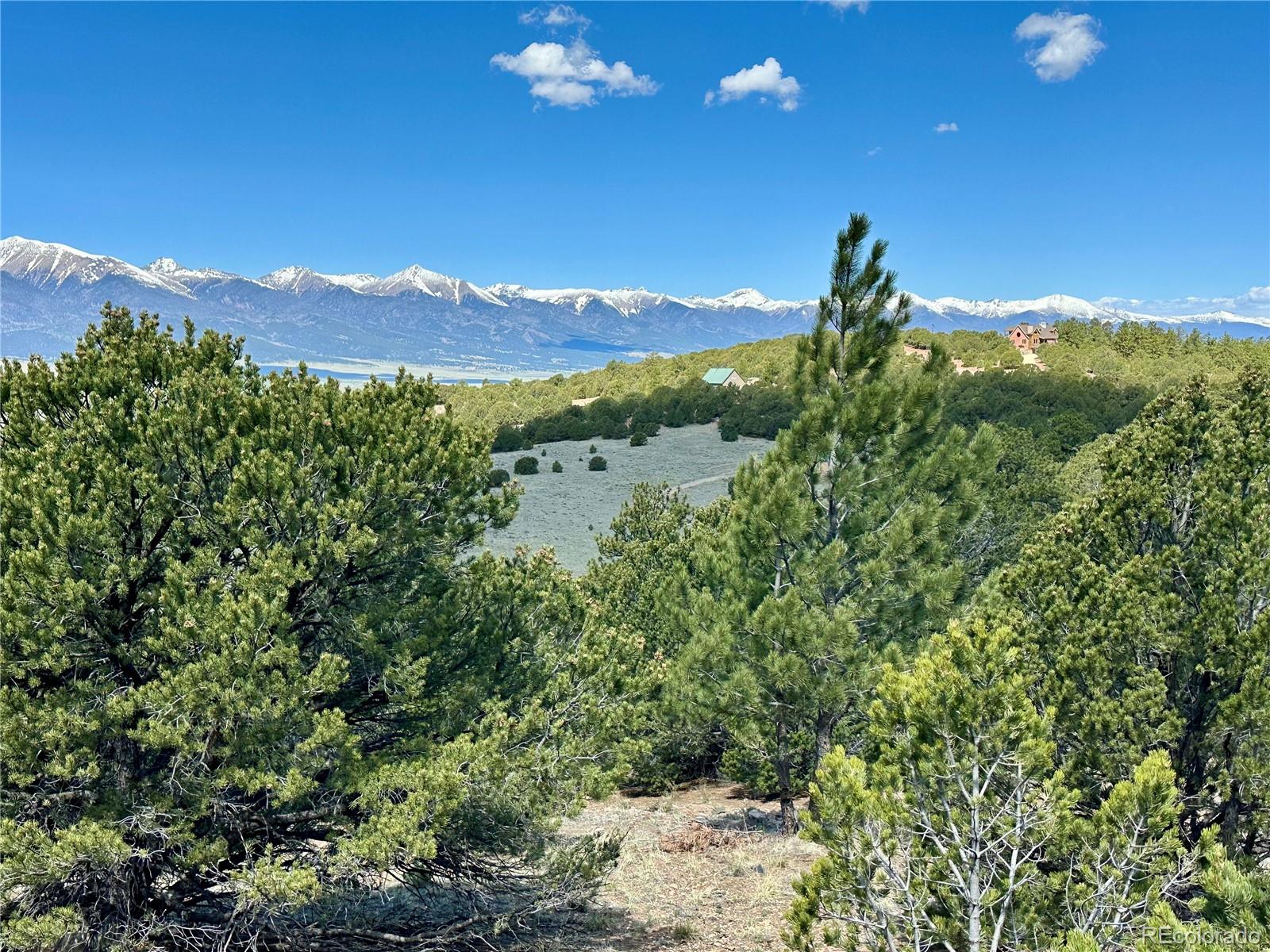 349 Navajo Road Westcliffe, CO 81252 - Photo 3 of 15 a view of a lake with a mountain in the background