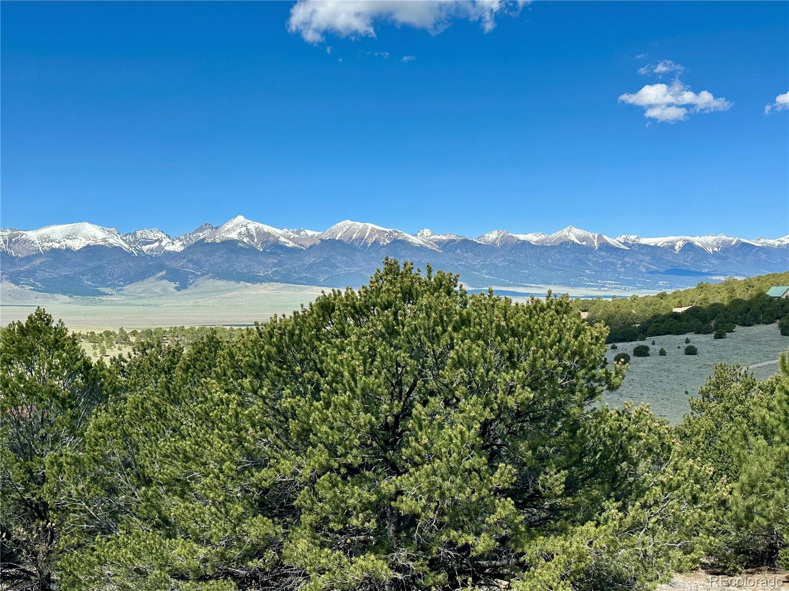 349 Navajo Road Westcliffe, CO 81252 - Photo 4 of 15 a view of a town with mountains in the background