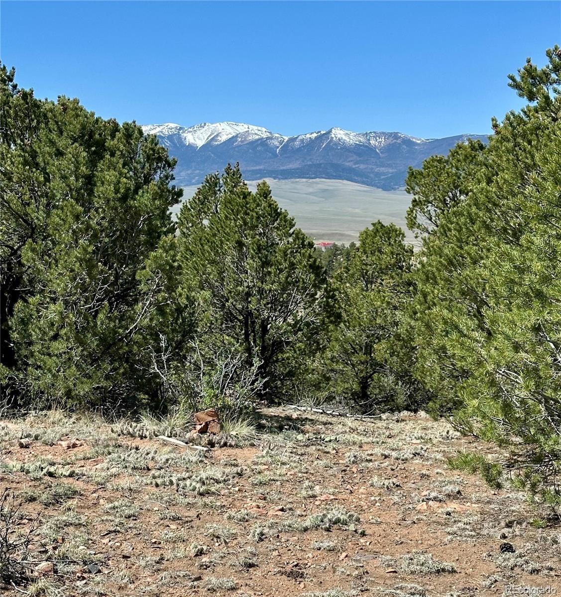 349 Navajo Road Westcliffe, CO 81252 - Photo 6 of 15 a view of a lake with a mountain in the background