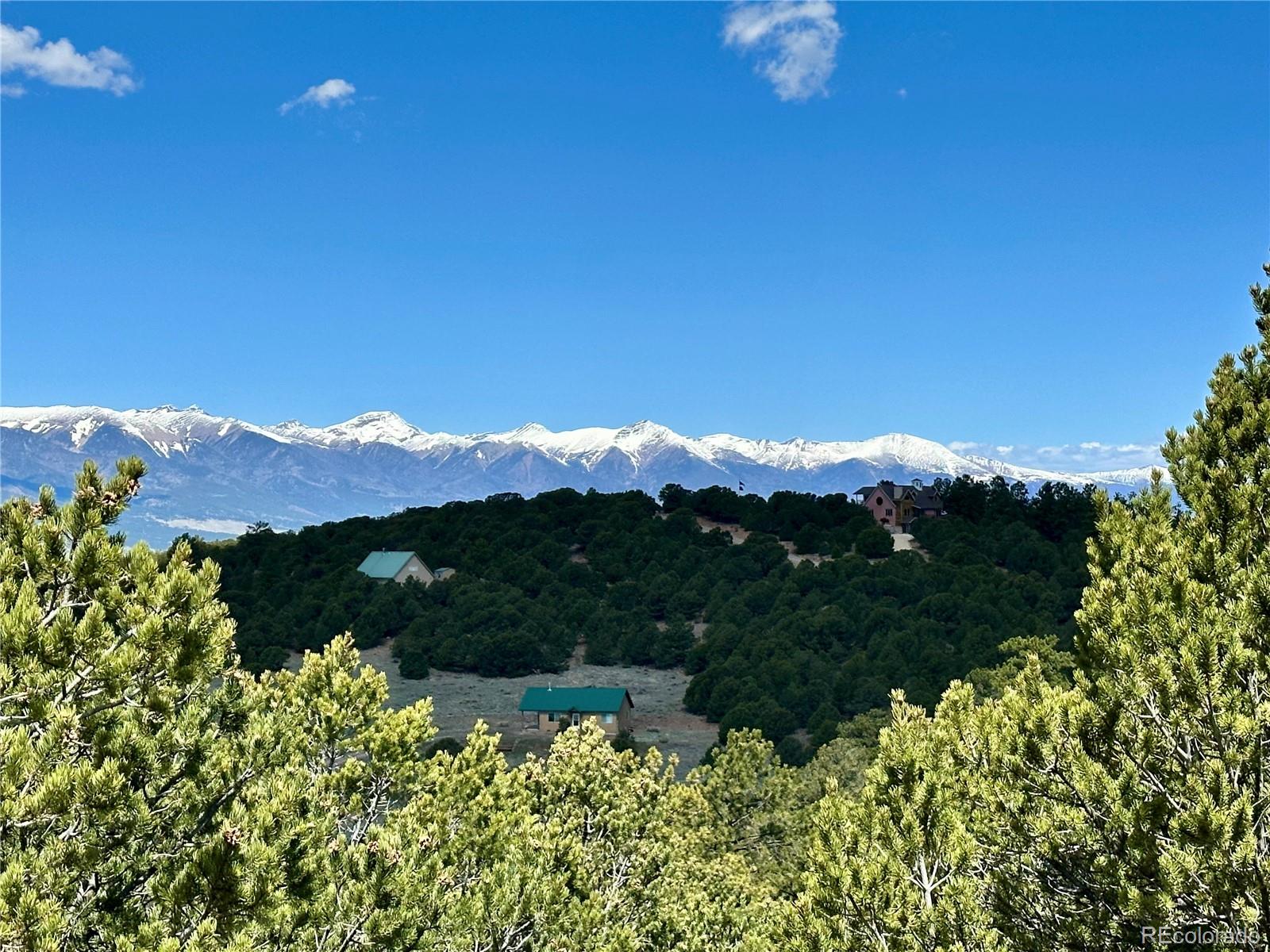 349 Navajo Road Westcliffe, CO 81252 - Photo 8 of 15 a view of a lake with a mountain in the background