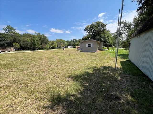a house view with a garden space