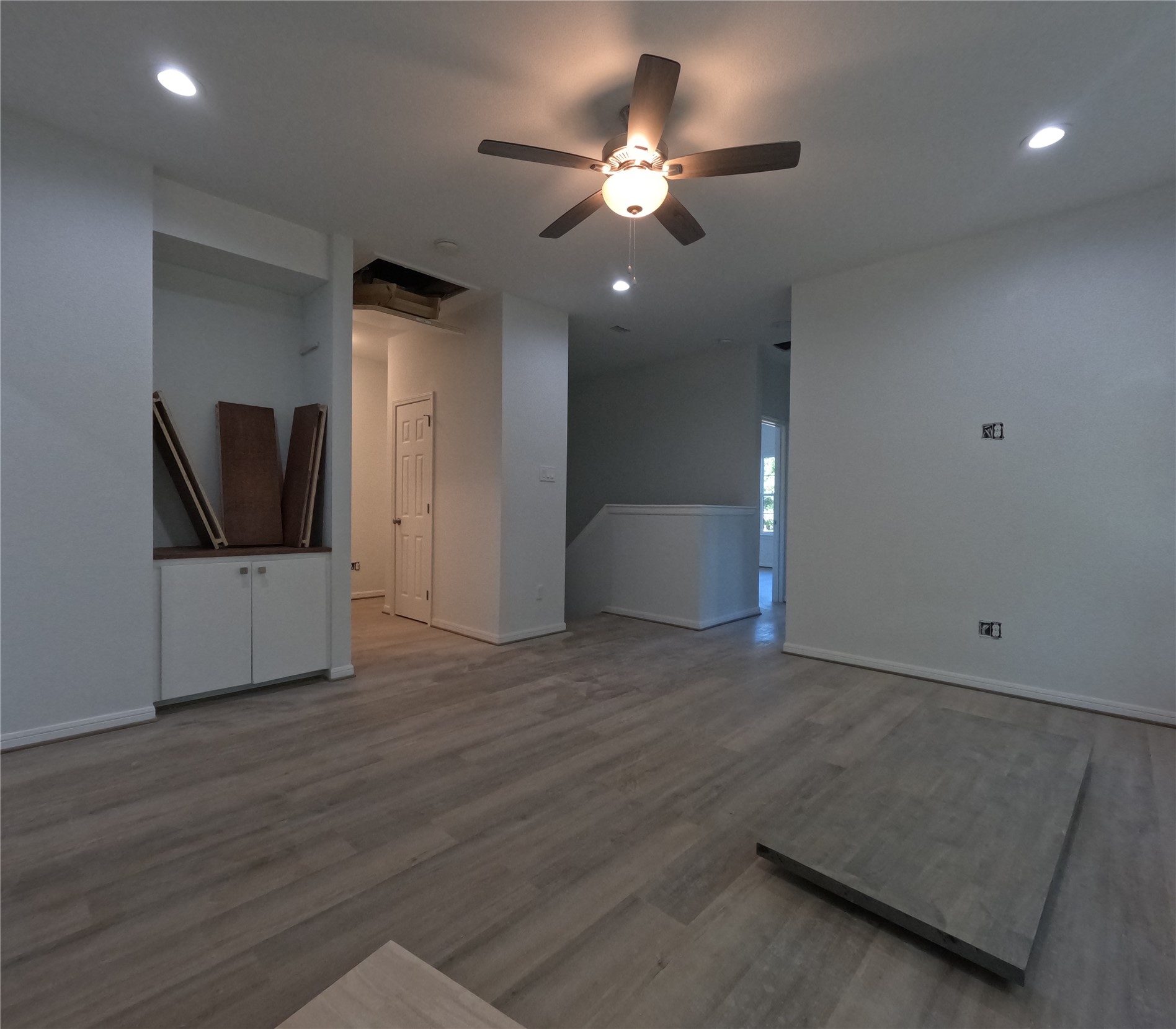 9427 Coffee Street Houston, TX 77033 - Photo 11 of 23 Upstairs looking towards stairway