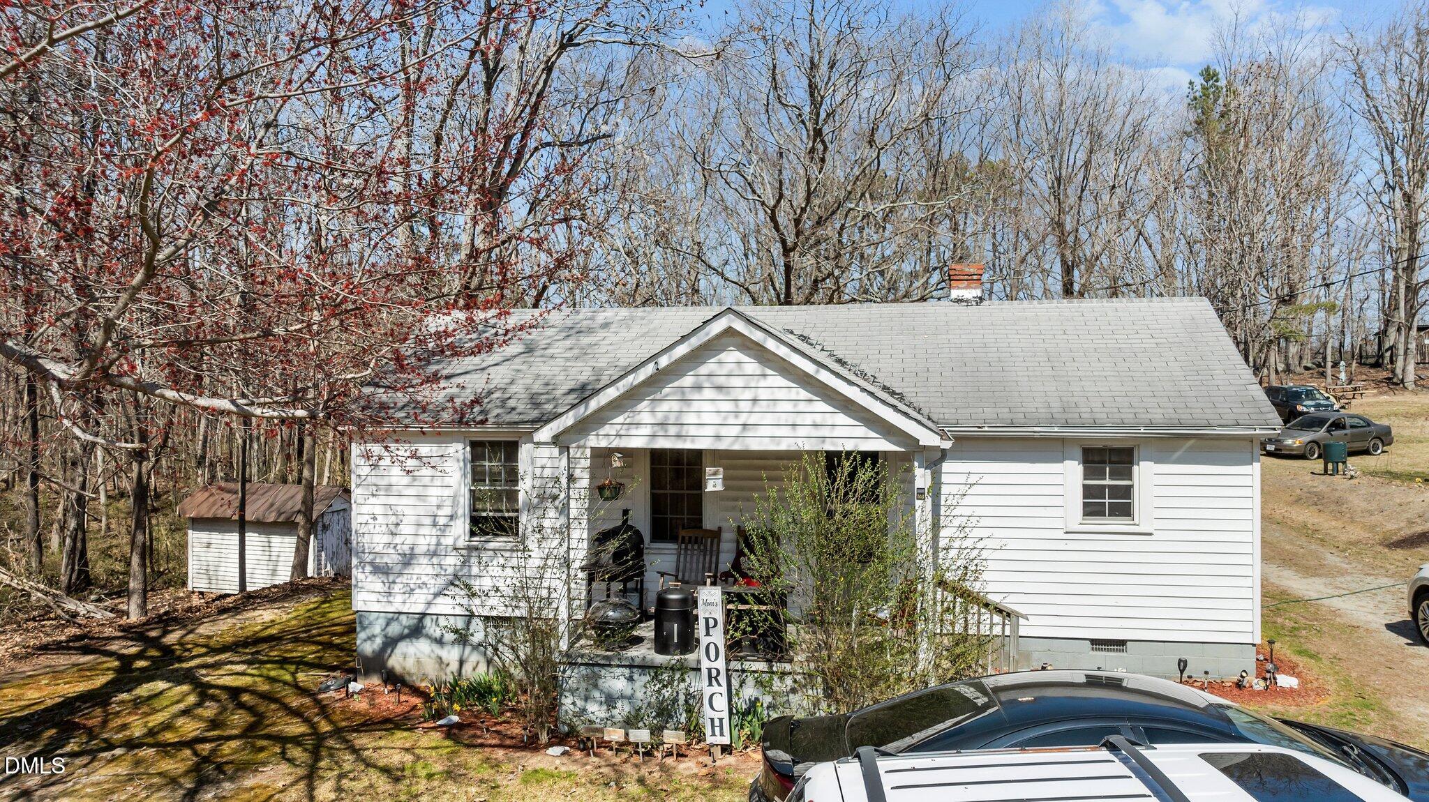 2710 Morton-Pulliam Road Roxboro, NC 27574 - Photo 5 of 13 a front view of a house with garden