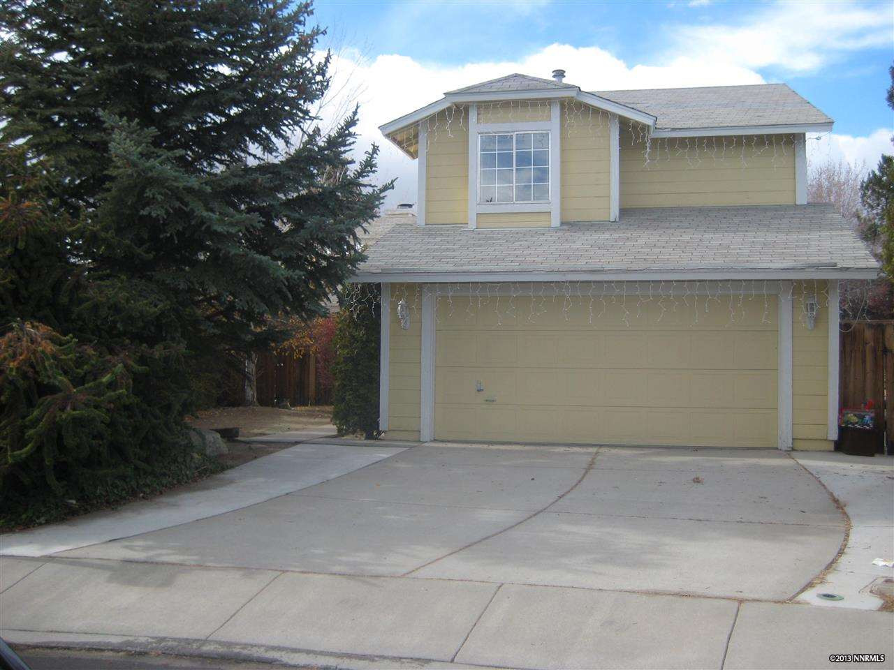 1017 Embassy Circle Reno, NV 89523 - Photo 1 of 1 a front view of a house with a garage