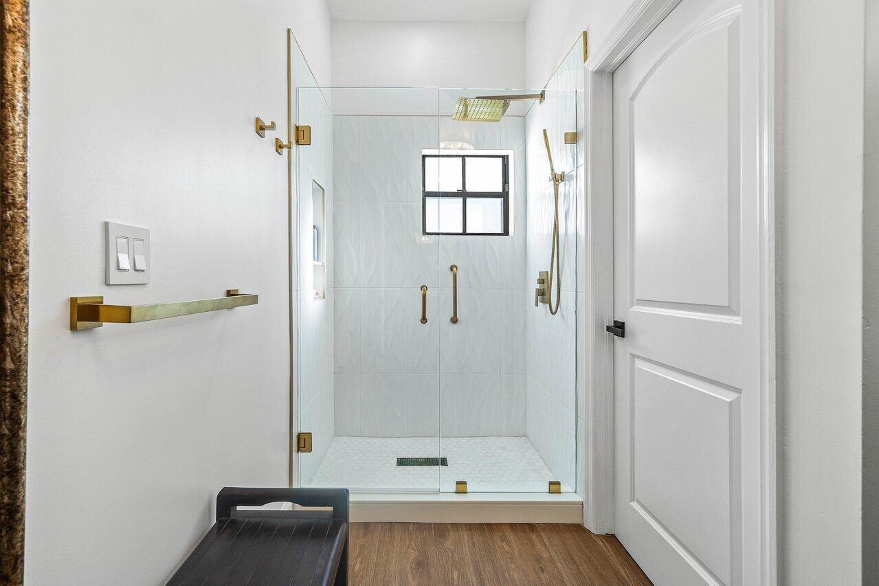 8195 Mooring Circle Boynton Beach, FL 33472 - Photo 15 of 28 a bathroom with a bathtub and a shower