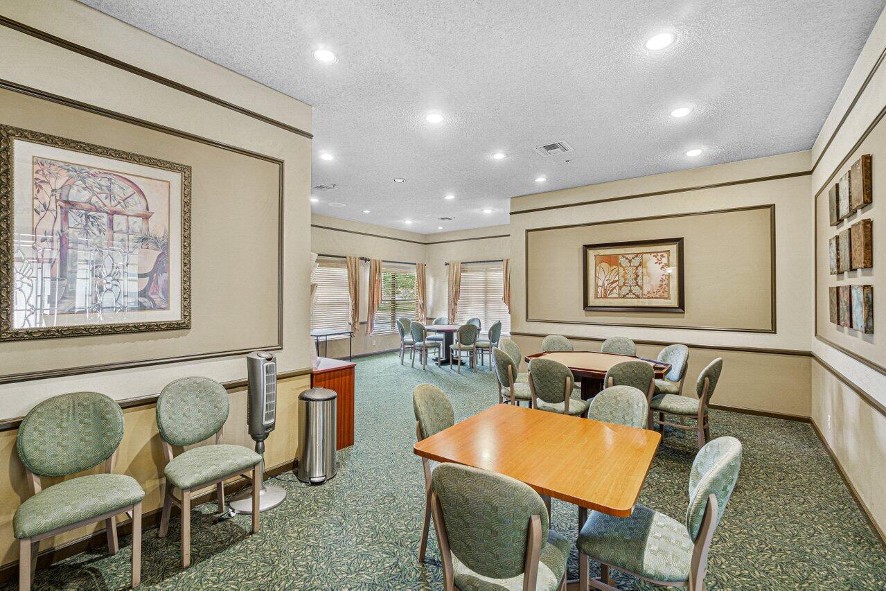 8195 Mooring Circle Boynton Beach, FL 33472 - Photo 22 of 28 a living room with furniture and a wooden floor