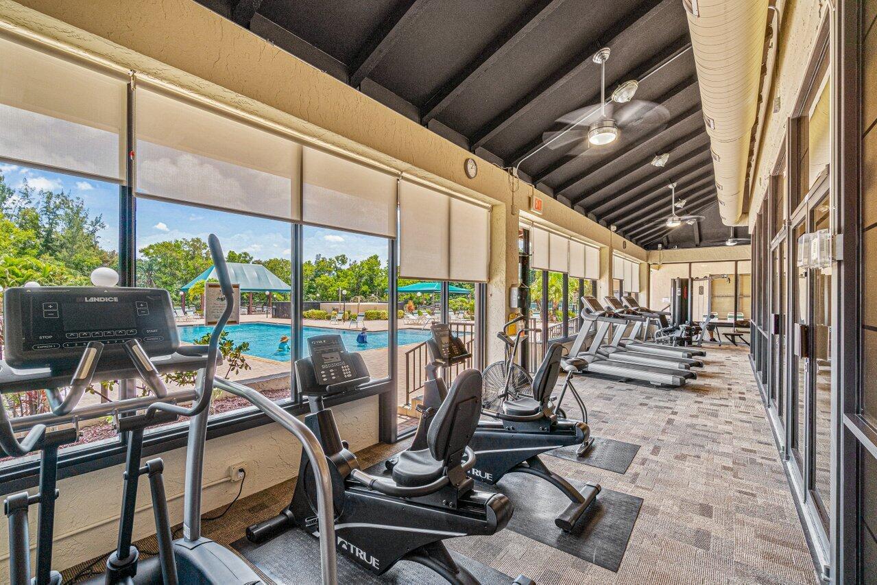 8195 Mooring Circle Boynton Beach, FL 33472 - Photo 23 of 28 a view of a room with gym equipment