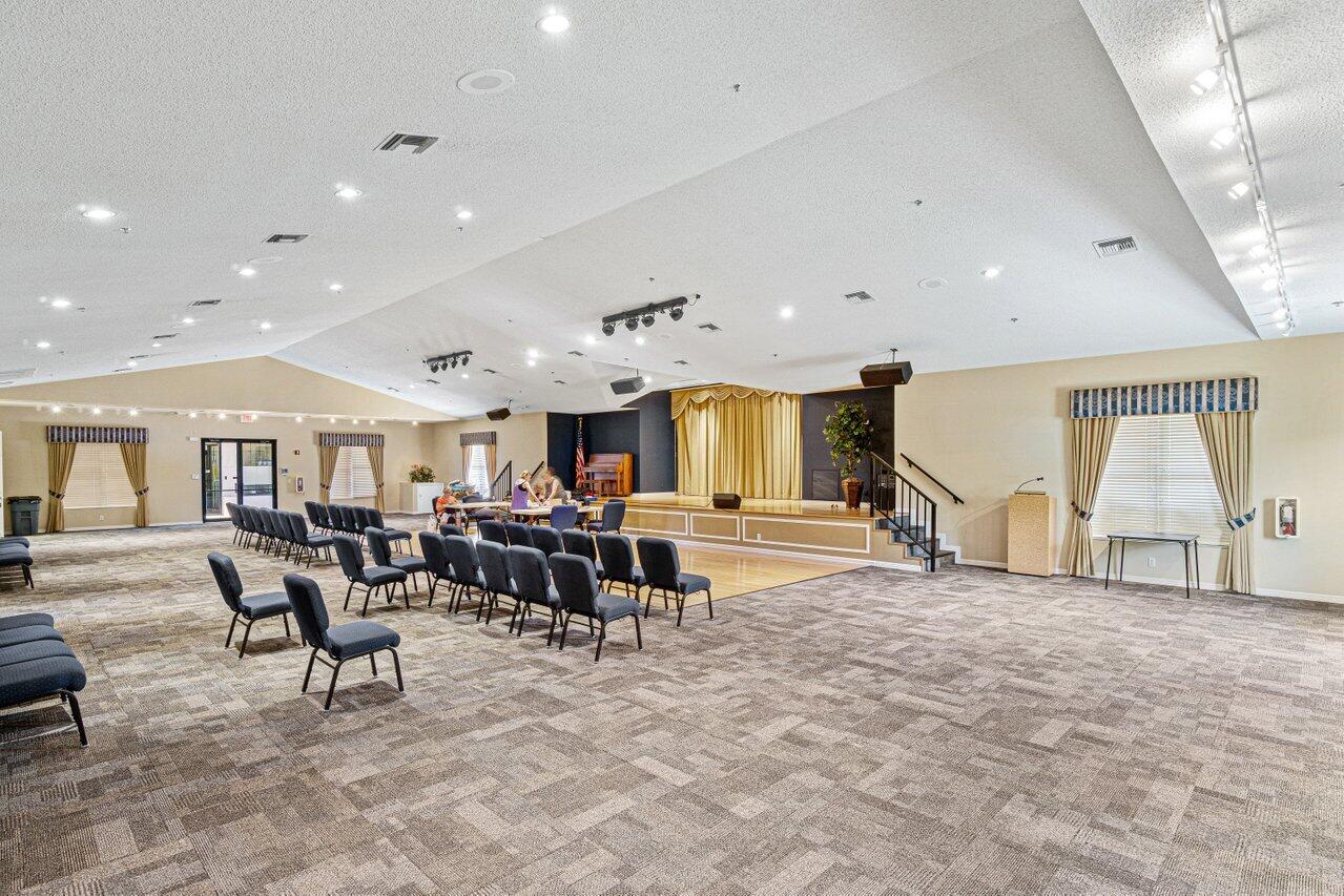 8195 Mooring Circle Boynton Beach, FL 33472 - Photo 24 of 28 a living room with furniture and a large window