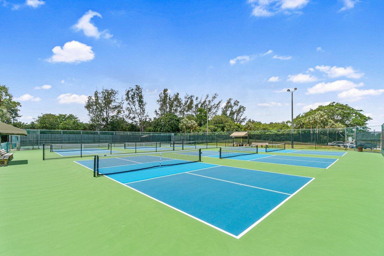 8195 Mooring Circle Boynton Beach, FL 33472 - Photo 27 of 28 a view of an outdoor space and tennis court