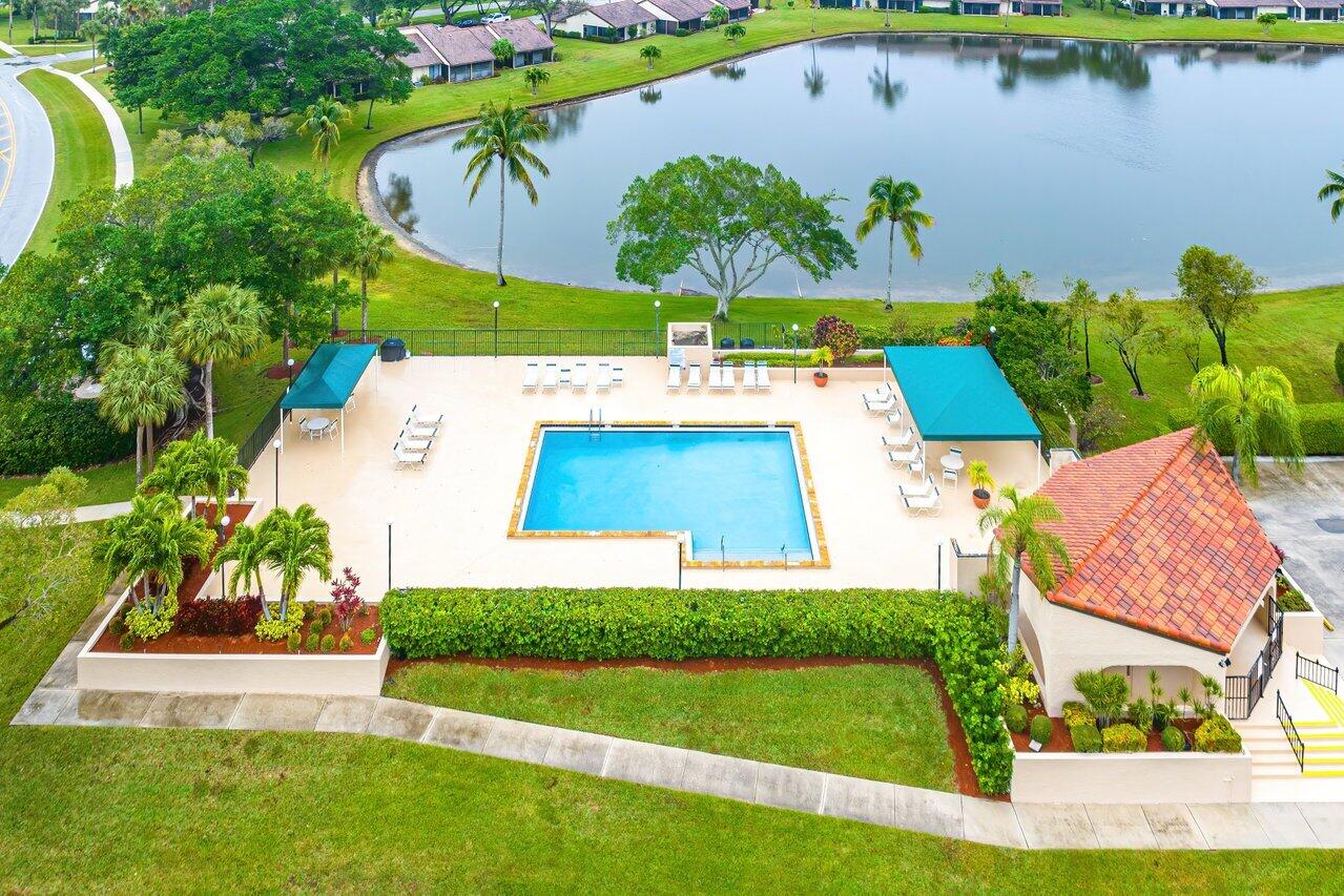 8195 Mooring Circle Boynton Beach, FL 33472 - Photo 28 of 28 an aerial view of a house with a swimming pool yard and outdoor seating