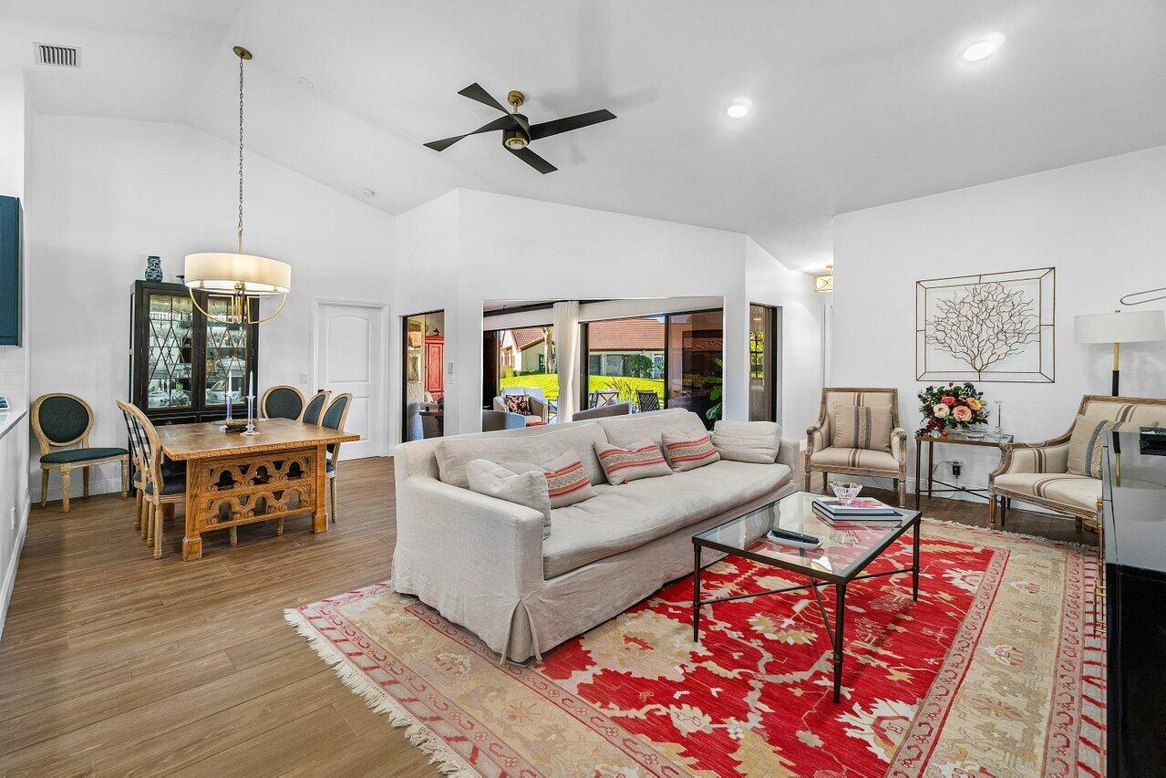 8195 Mooring Circle Boynton Beach, FL 33472 - Photo 5 of 28 a living room with furniture and a large window