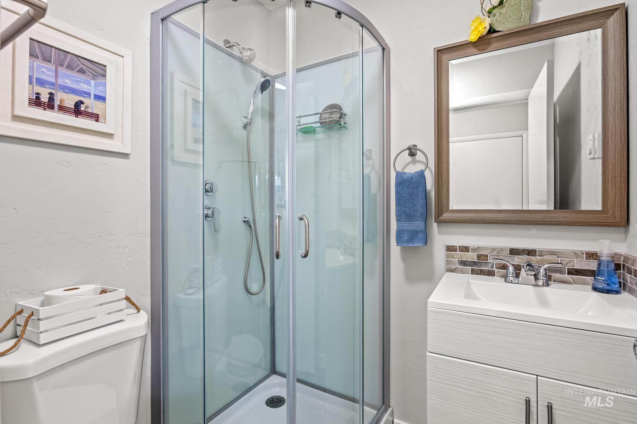 2208 Keithley Creek Road Midvale, ID 83645 - Photo 29 of 45 Full bath with vanity and a stall shower