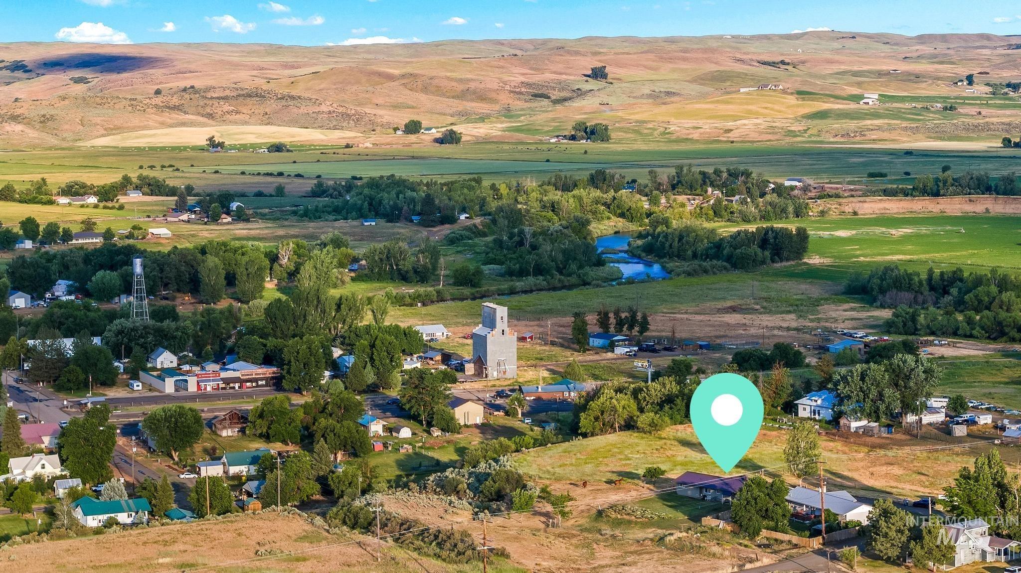 2208 Keithley Creek Road Midvale, ID 83645 - Photo 4 of 45 Aerial view of sparsely populated area with a mountain backdrop