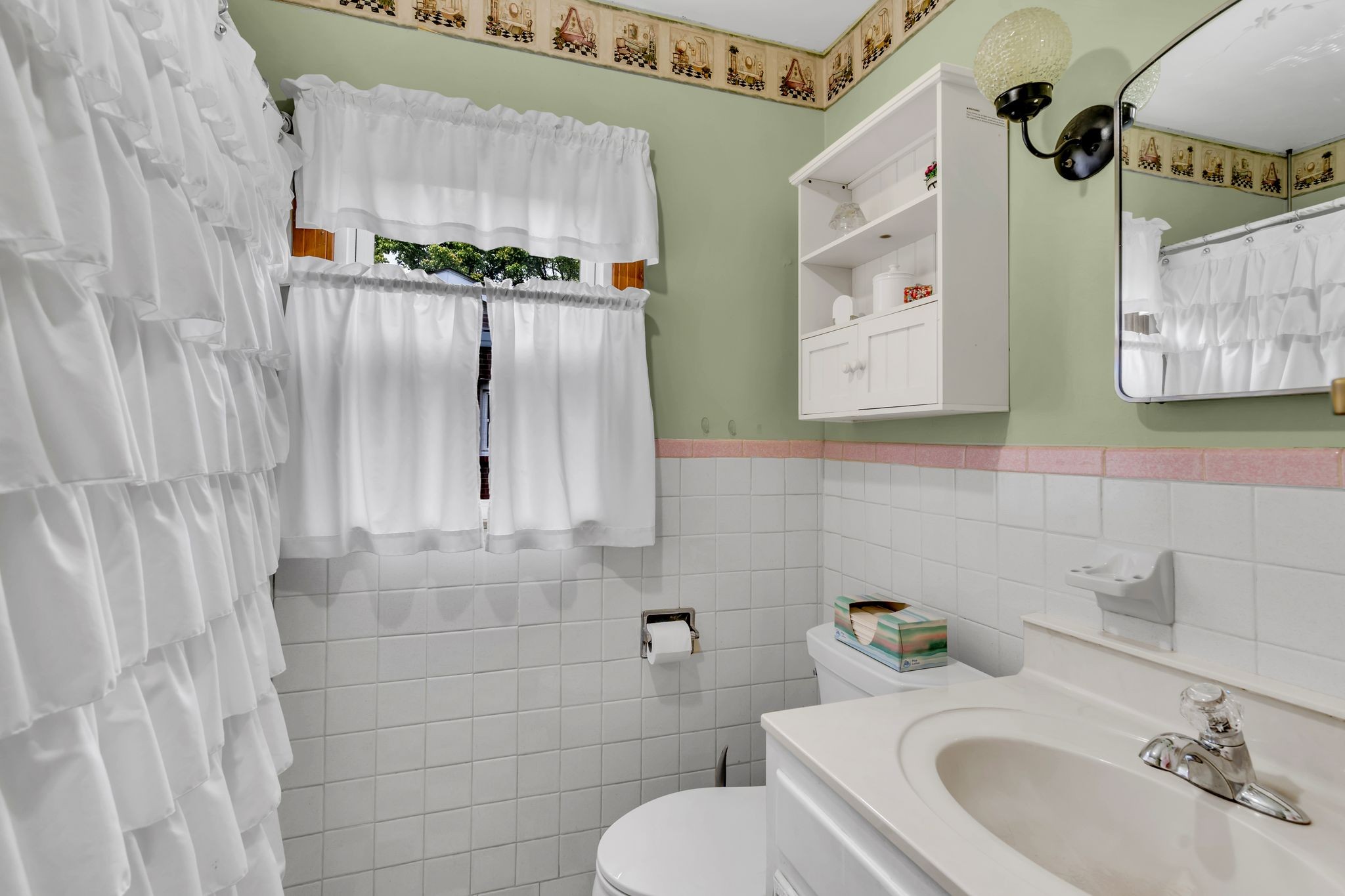 1801 Golf Club Road Old Hickory, TN 37138 - Photo 18 of 32 Bathroom with tub and shower. This is in the hallway and not attached to the bedroom.