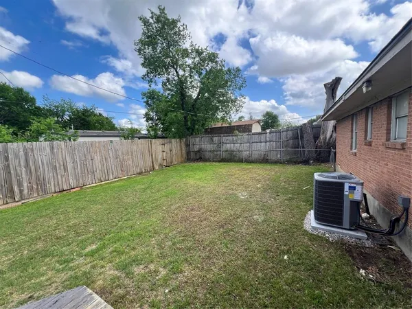a view of a backyard with a garden