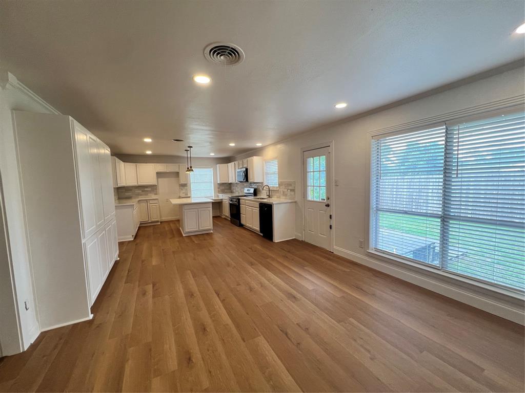 2406 Ridgecrest Drive Garland, TX 75041 - Photo 5 of 22 Dining room and Kitchen