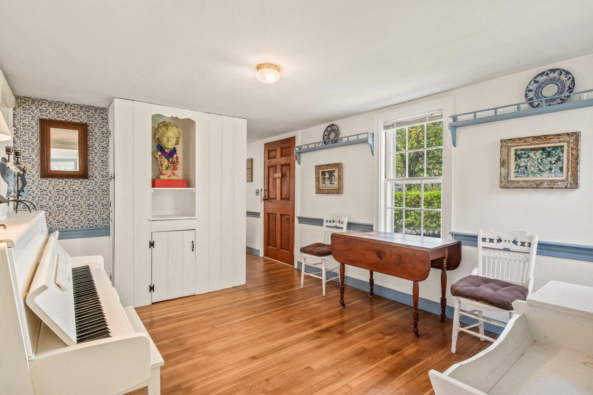31 Mill Pond Road Chatham, MA 02633 - Photo 14 of 37 a living room with furniture and a wooden floor