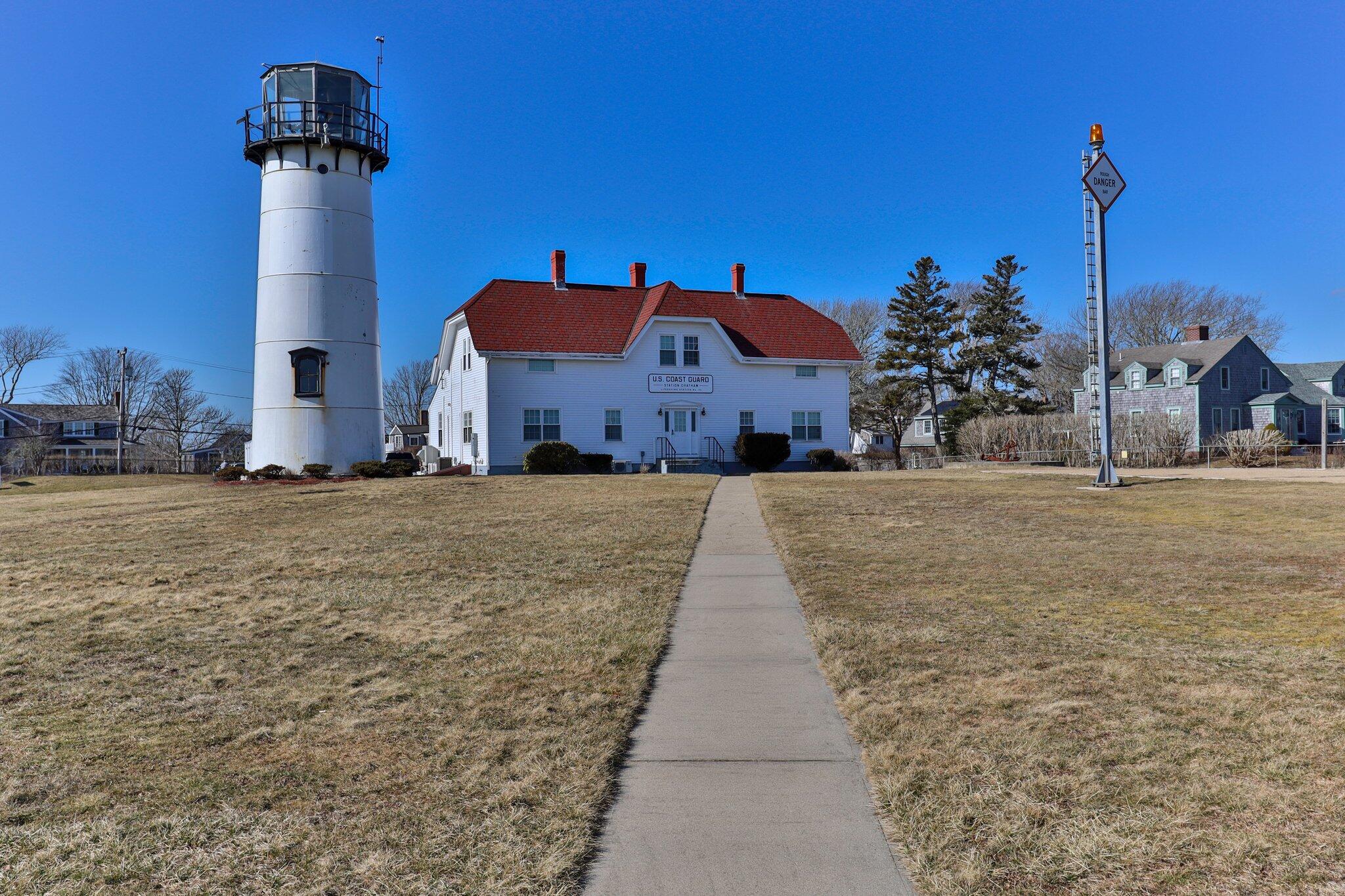 31 Mill Pond Road Chatham, MA 02633 - Photo 33 of 37 a front view of a house with a yard