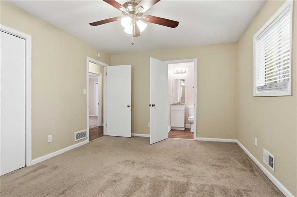 4505 Wonder Valley Trail Decatur, GA 30034 - Photo 18 of 34 a view of an empty room with a window