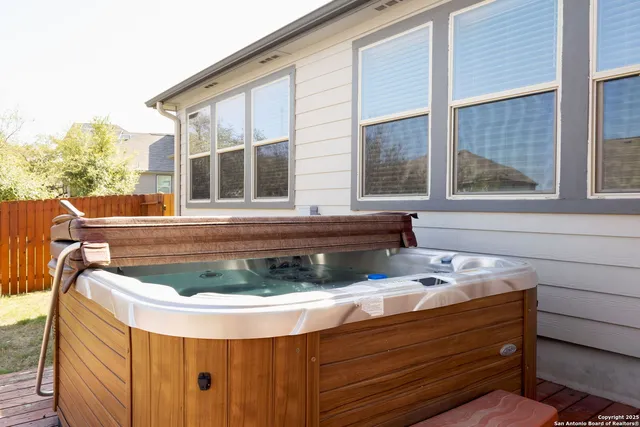 a view of house and chair and fire pit