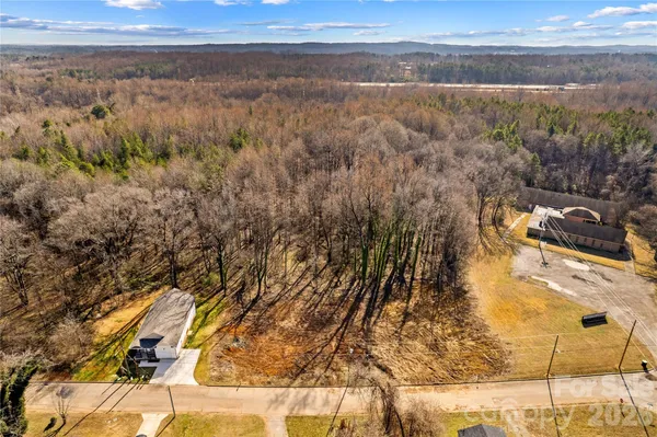 a view of a yard with an outdoor space