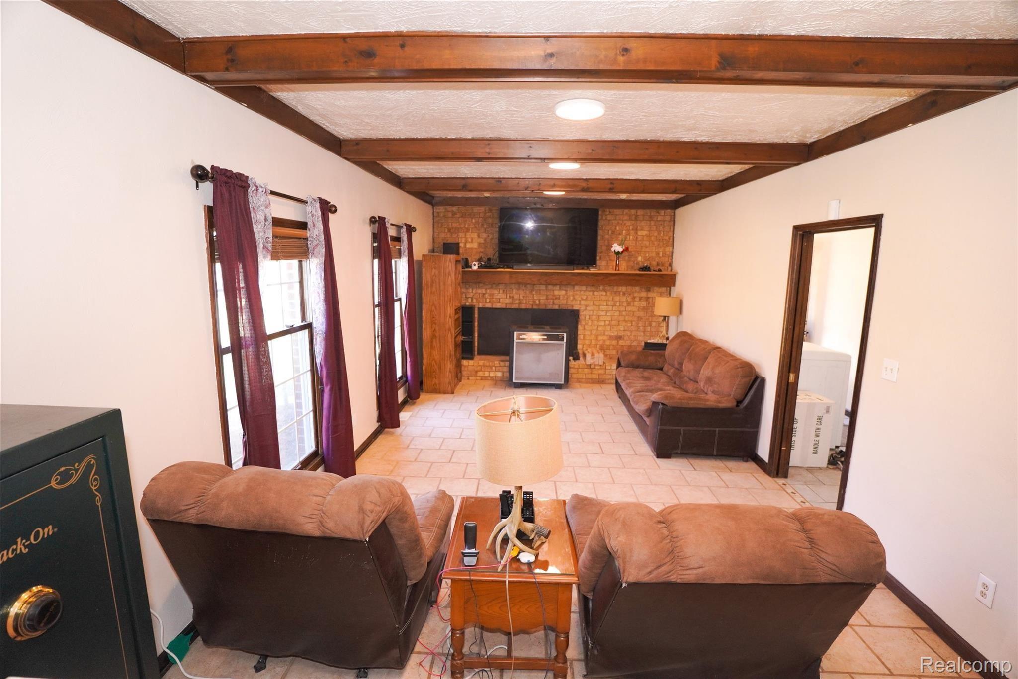 7160 Crofoot Road Fowlerville, MI 48836 - Photo 24 of 46 Family Room with Brick Fireplace!
