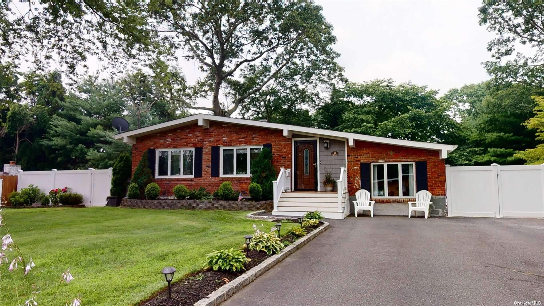 30 Stephen Road Bayport, NY 11705 - Photo 1 of 1 a view of a house with backyard and sitting area