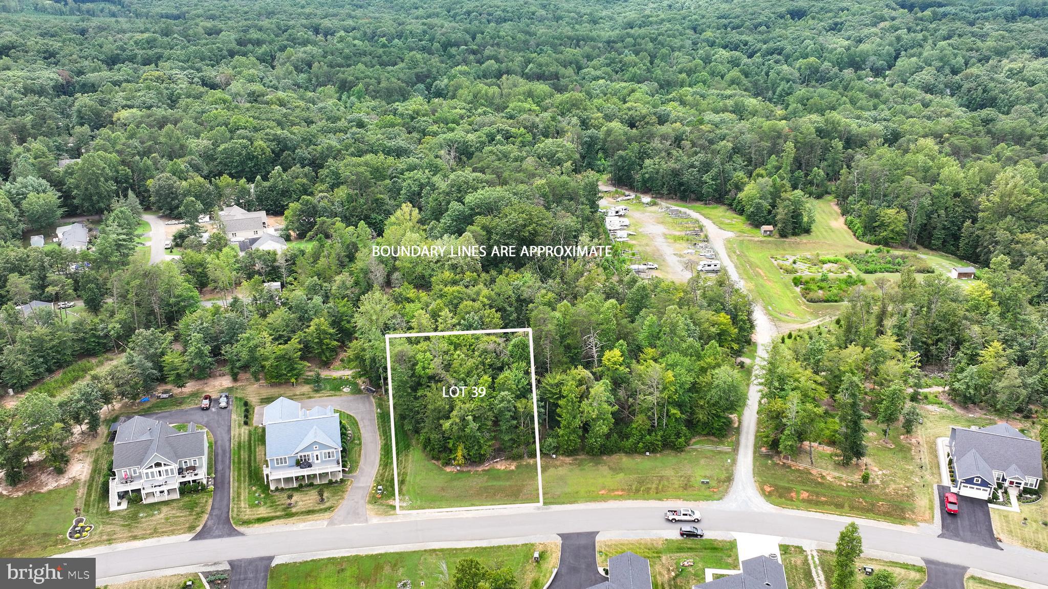 Lot 39 Sunset Loop Mineral, VA 23117 - Photo 4 of 15 an aerial view of a houses with yard