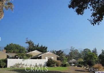 505 North Old Ranch Road Arcadia, CA 91007 - Photo 4 of 6 a front view of a house with a yard and garage