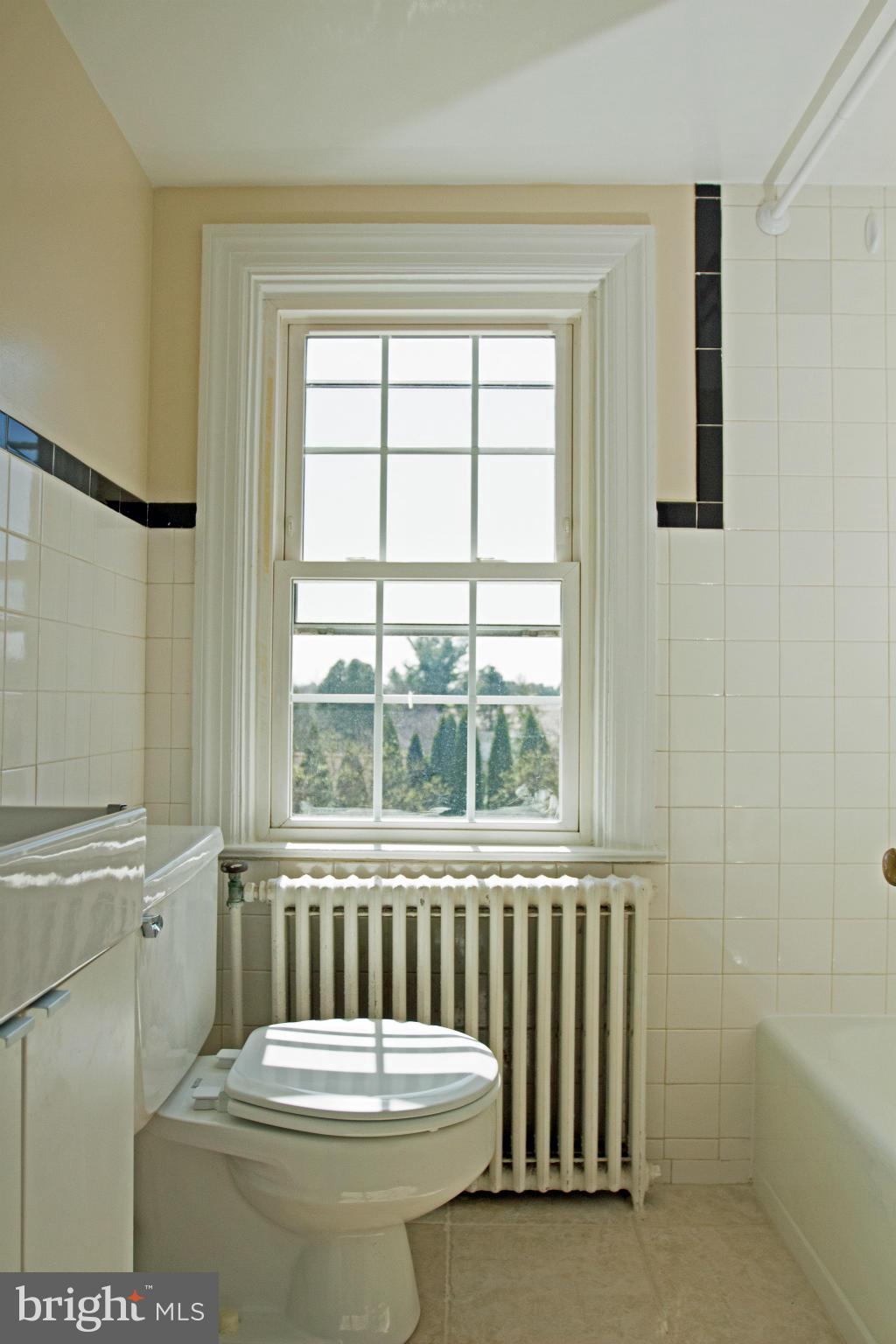5303 Glen Falls Road Reisterstown, MD 21136 - Photo 11 of 30 a bathroom with a sink and a toilet