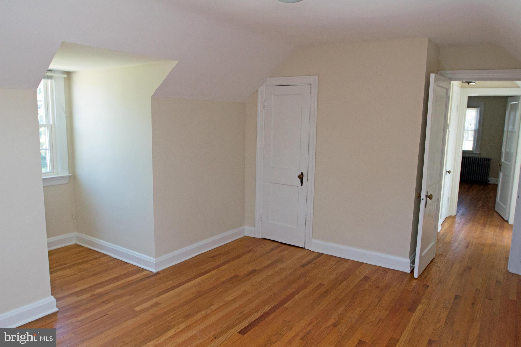 5303 Glen Falls Road Reisterstown, MD 21136 - Photo 18 of 30 a view of a hallway with wooden floor
