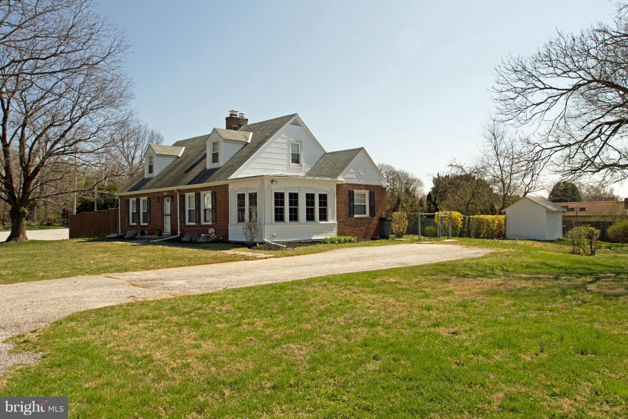 5303 Glen Falls Road Reisterstown, MD 21136 - Photo 28 of 30 a front view of a house with a garden
