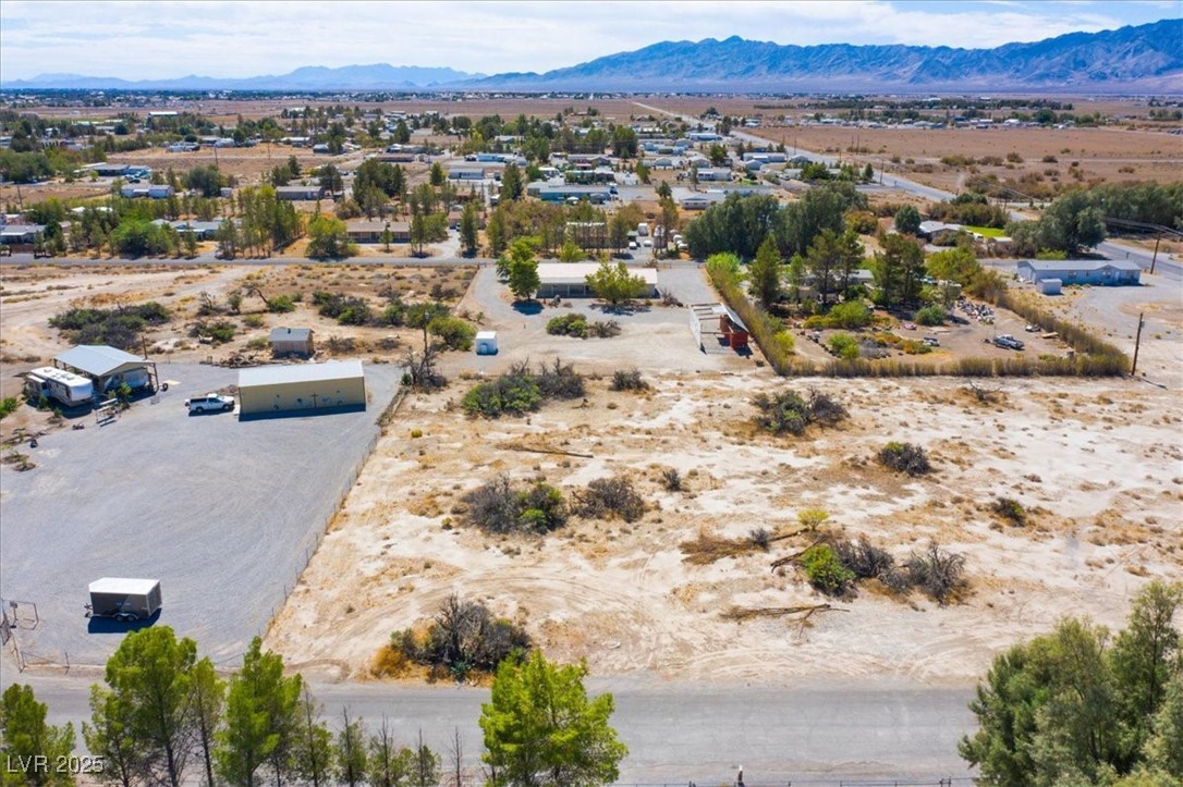 1921 West Dyer Road Pahrump, NV 89048 - Photo 11 of 28 View of rural area featuring a desert landscape and mountains