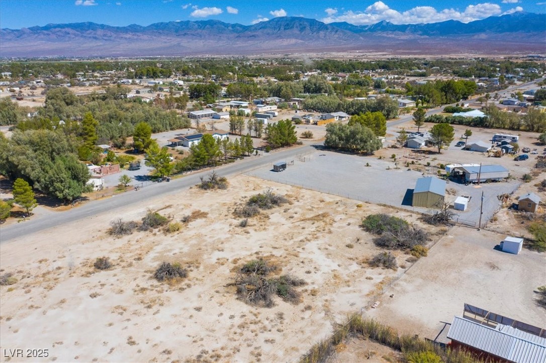 1921 West Dyer Road Pahrump, NV 89048 - Photo 14 of 28 Aerial view of a mountain backdrop