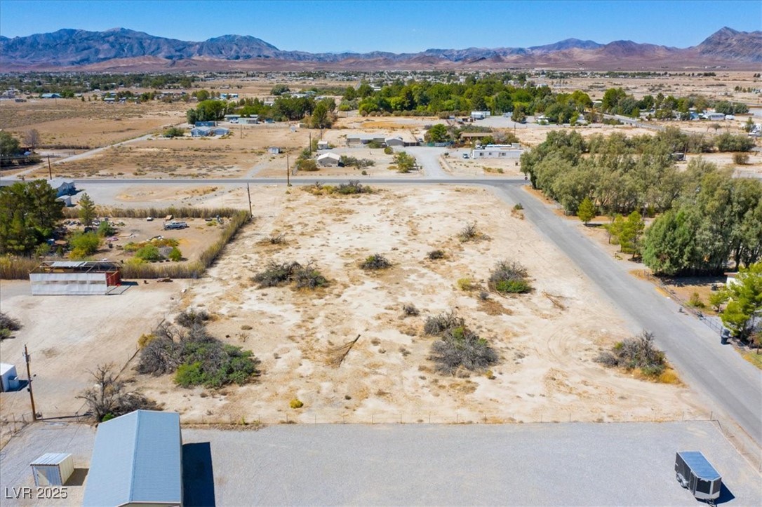1921 West Dyer Road Pahrump, NV 89048 - Photo 17 of 28 Aerial view of sparsely populated area with a mountainous background