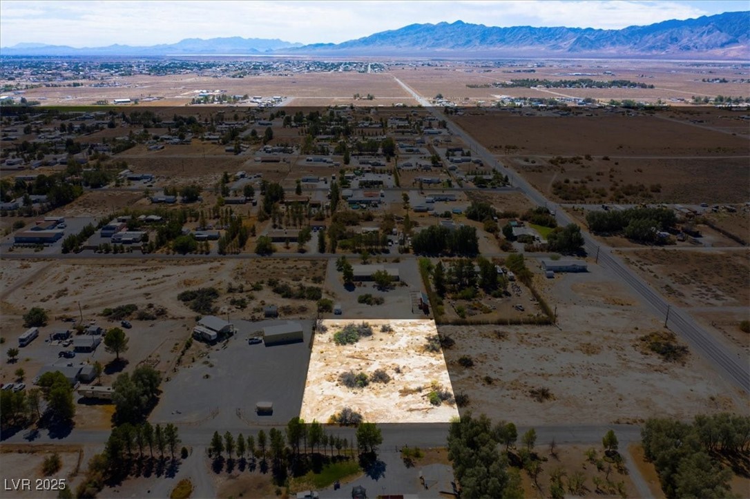 1921 West Dyer Road Pahrump, NV 89048 - Photo 2 of 28 View of rural area with a desert landscape and a mountain backdrop