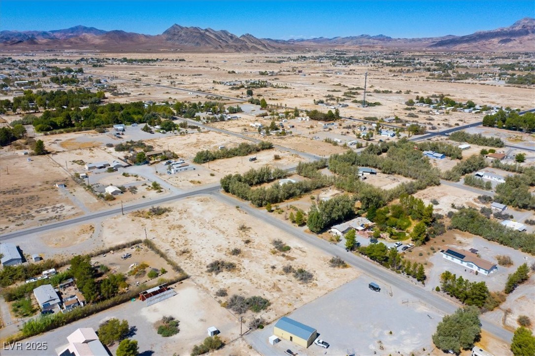 1921 West Dyer Road Pahrump, NV 89048 - Photo 24 of 28 Overview of rural landscape featuring a desert landscape and a mountain backdrop