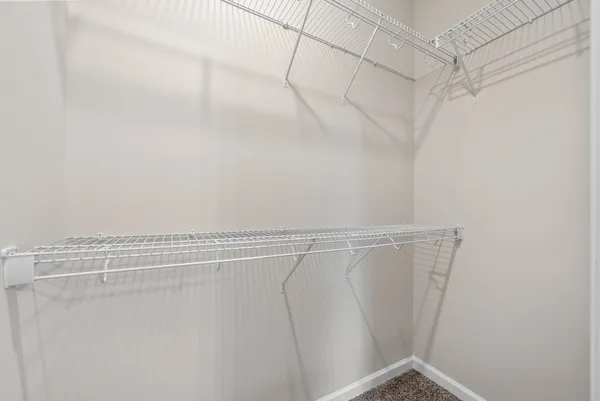 a view of a room with racks on the wall