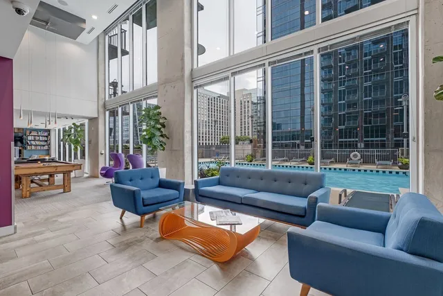 a kitchen with a table and chairs