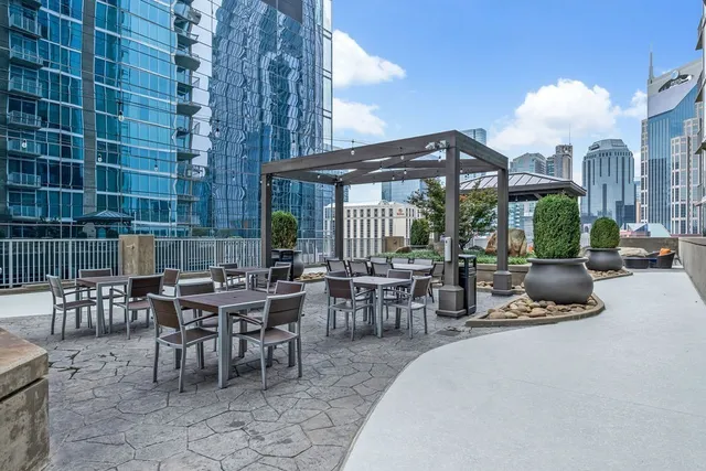 a view of a swimming pool with a terrace