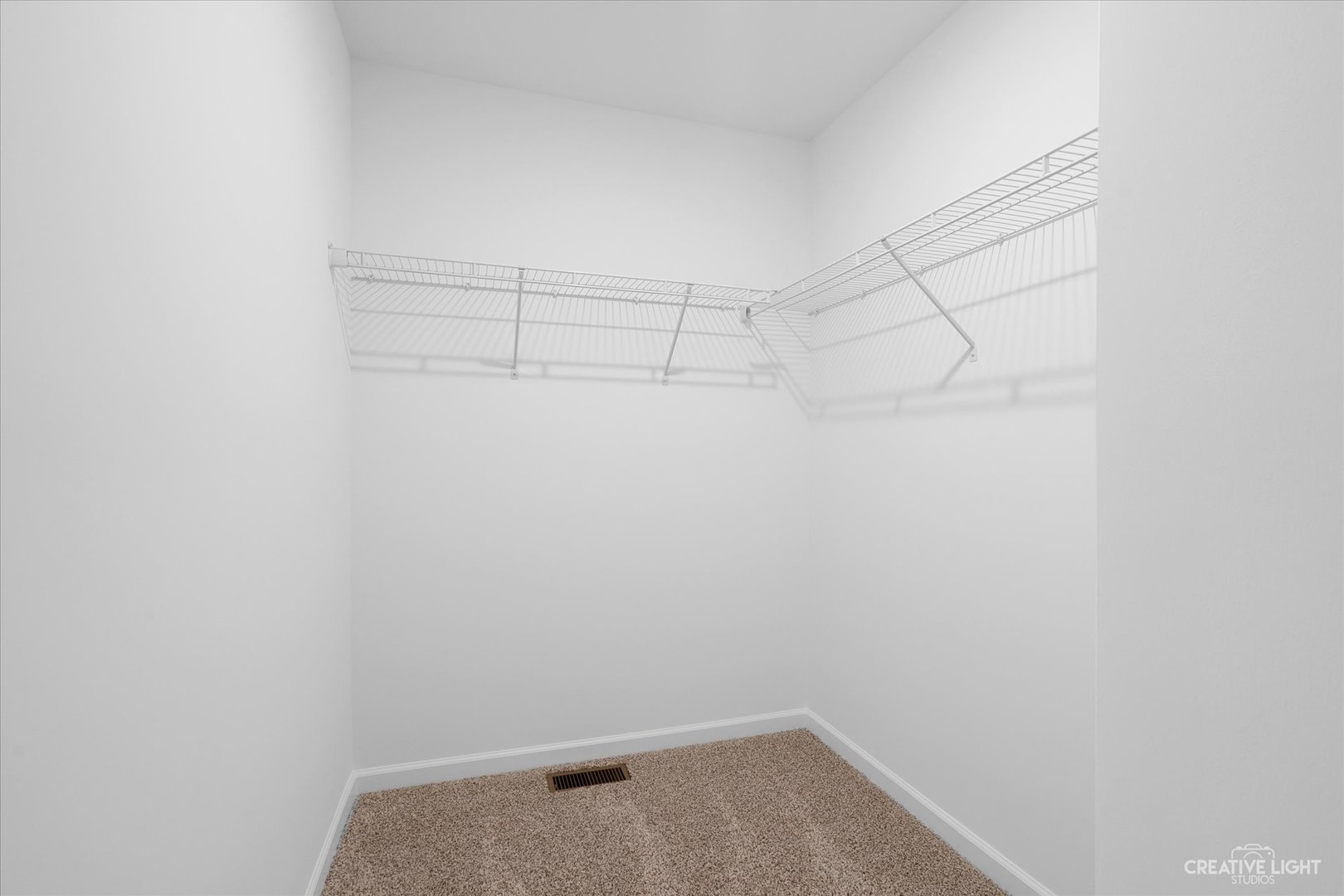 501 Hahn Drive Cortland, IL 60112 - Photo 23 of 27 a view of a room with racks on the wall