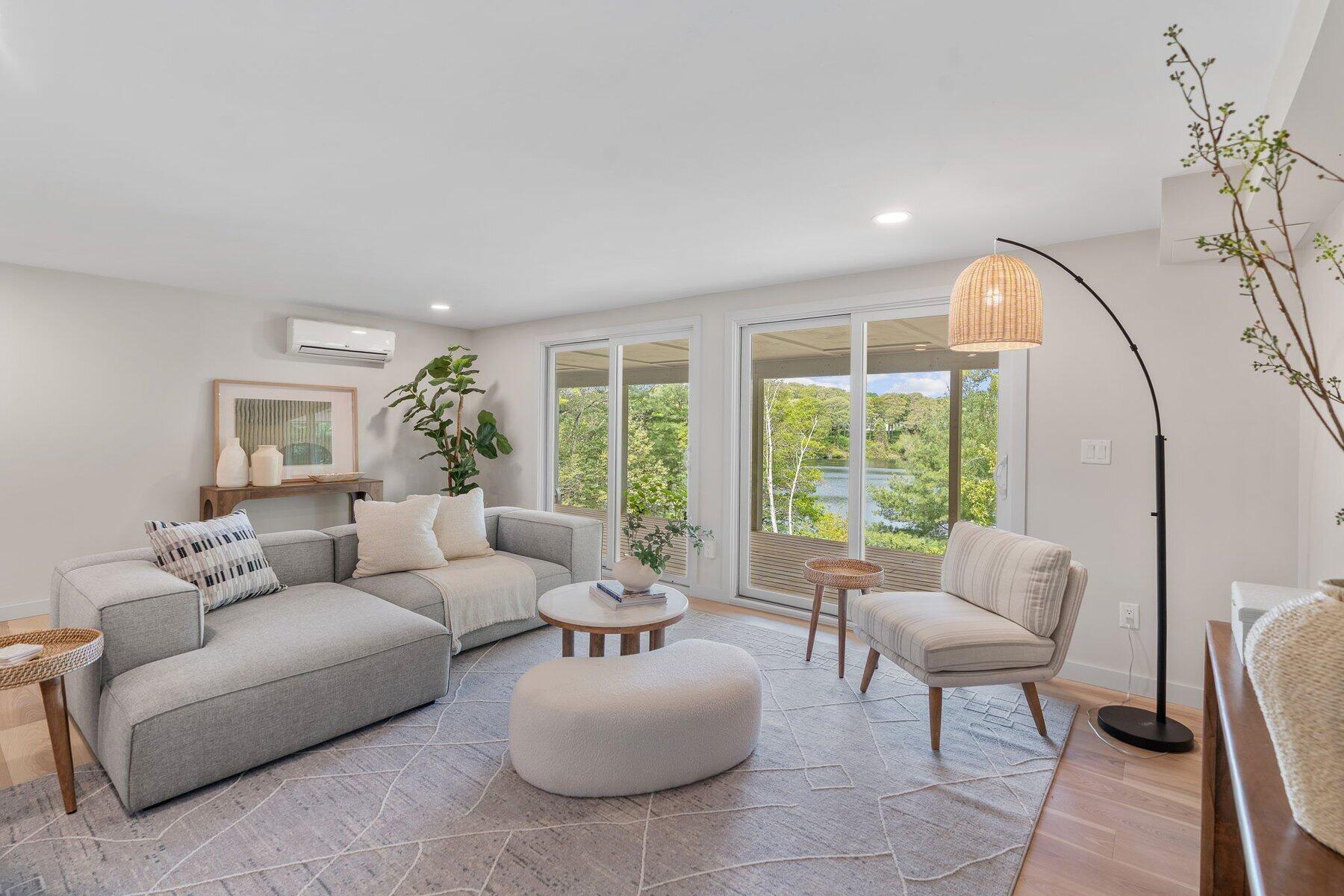162 Main Street Osterville, MA 02655 - Photo 27 of 50 a living room with furniture and a large window