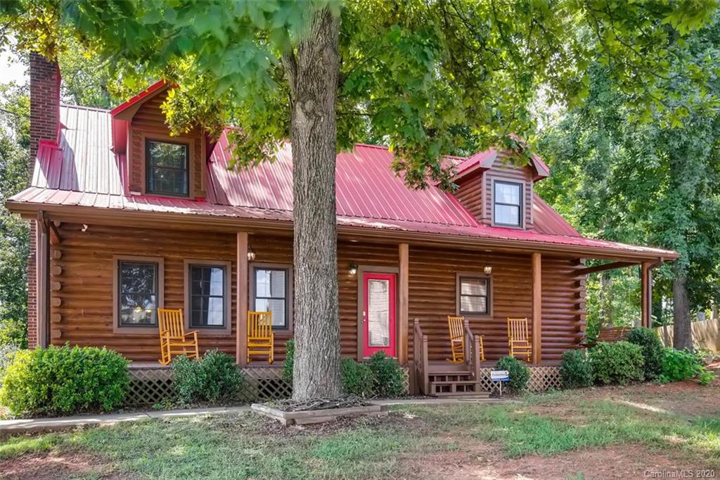 4323 Hubbard Road Charlotte, NC 28269 - Photo 34 of 35 a front view of a house with garden
