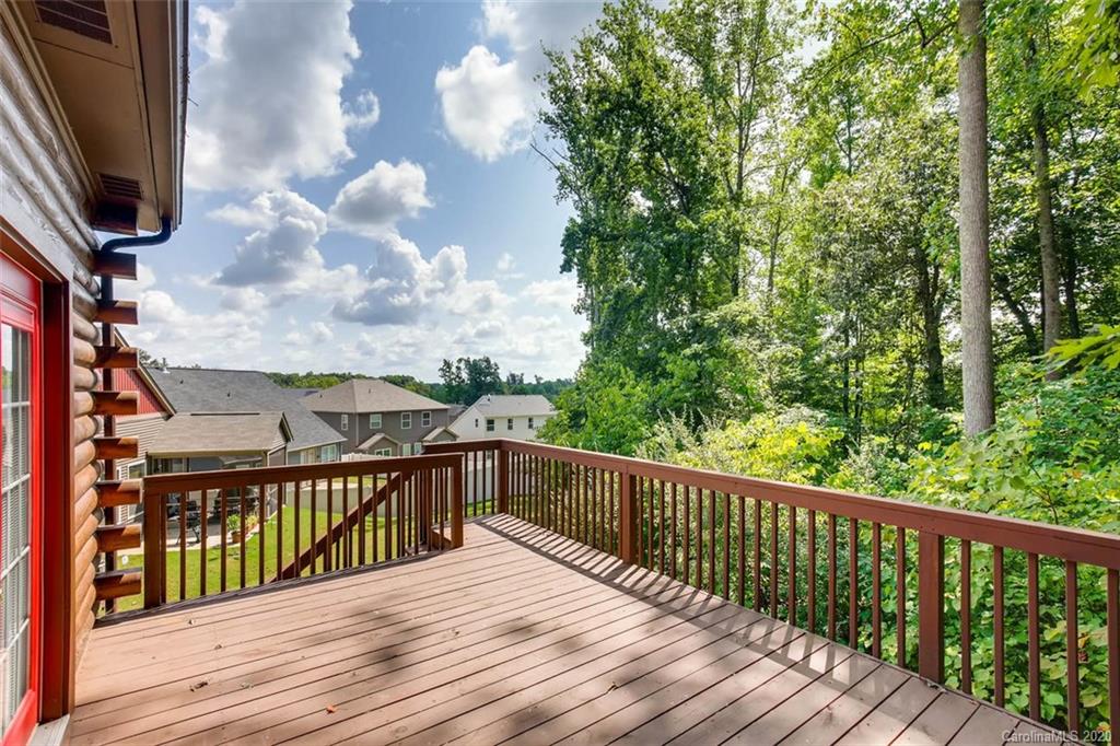 4323 Hubbard Road Charlotte, NC 28269 - Photo 35 of 35 a view of balcony with wooden floor and fence