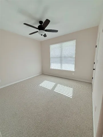 a view of empty room with windows