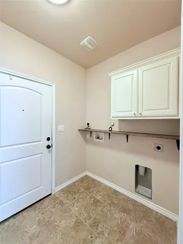 a view of a kitchen with a sink