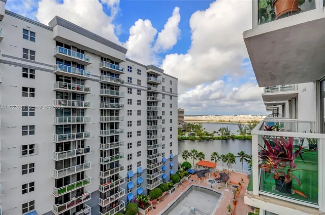 a view of balcony with wooden floor
