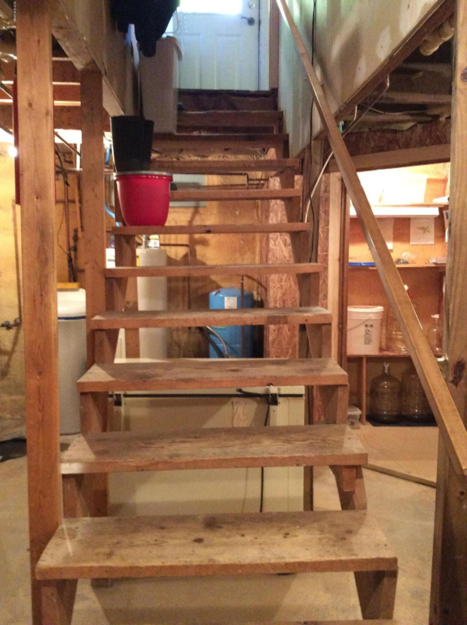 12412 Griffith Road Brethren, MI 49619 - Photo 23 of 66 Basement Staircase